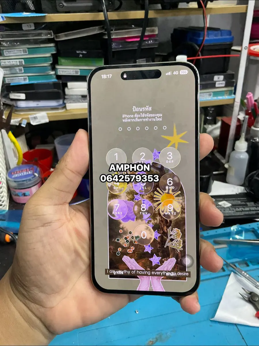 iPhone แสดงหน้าป้อนรหัสหลังเปิดเครื่องเพื่อทดสอบหน้าจอ